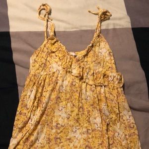 Candie’s yellow tank top